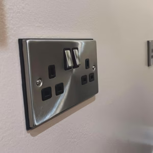 Modern brushed steel double socket installed by AMP Electrical Solutions